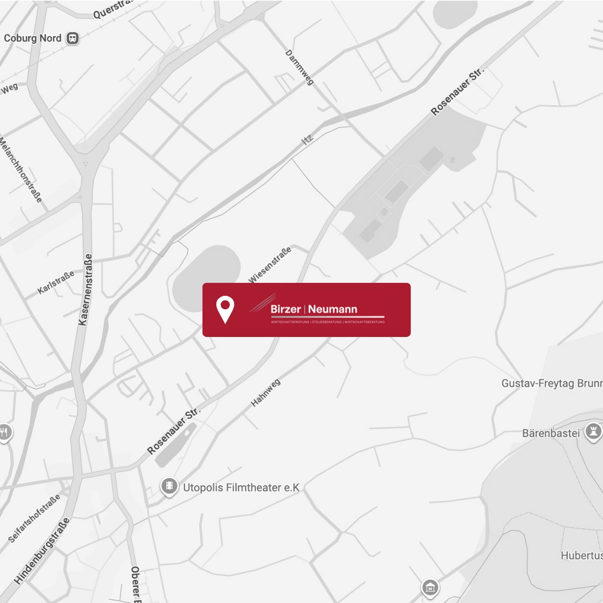 Stadtplan mit hervorgehobener Adresse und roter Positionsmarkierung.