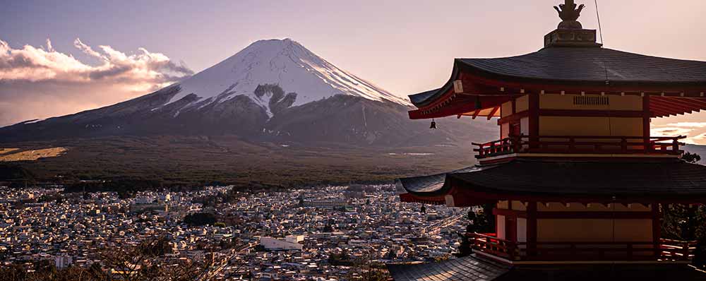 Peaceful Zen garden in Kyoto or a close-up of a traditional Japanese tea ceremony.