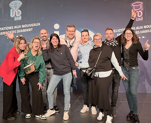 Equipe de conseillers immobiliers chez IAD immobilier