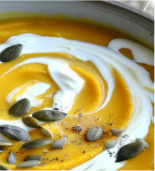Close-up of a woman's face seen through a textured glass, creating a blurred and obscured effect.