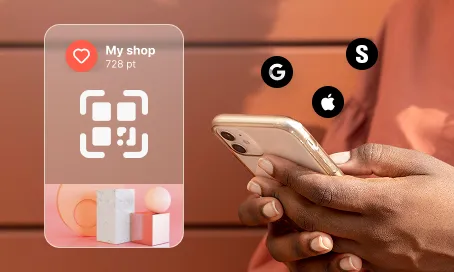 Hand holding smartphone with a digital loyalty card and app store icons floating nearby.