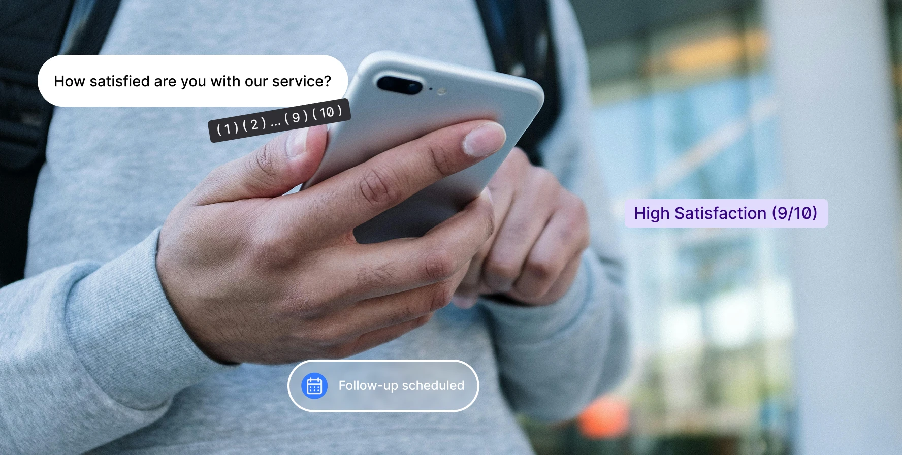 Person holding phone with satisfaction survey rating 9 out of 10 and follow-up scheduled notification.