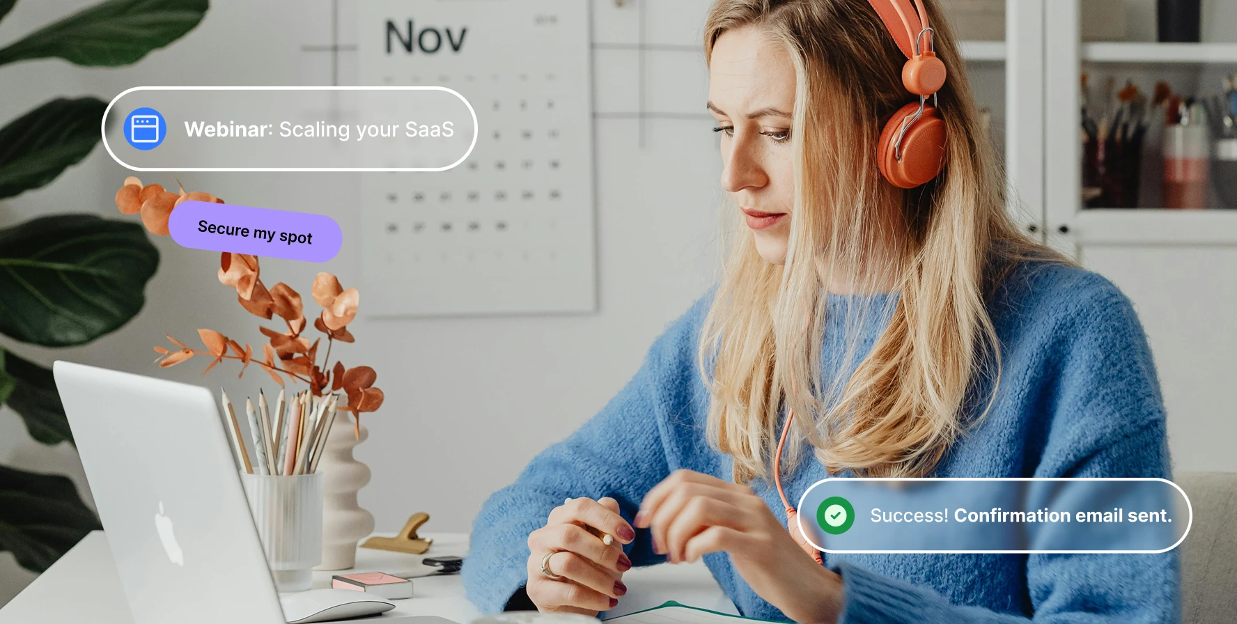 Woman in orange headphones and blue sweater working on laptop with webinar and registration prompts on screen.