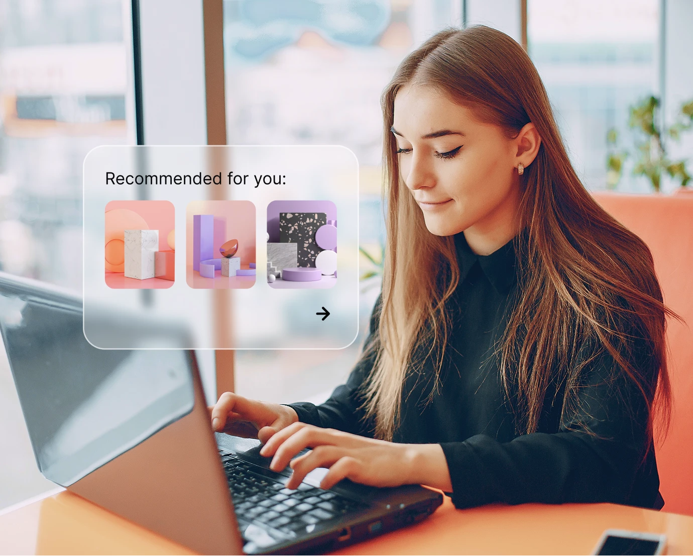 Young woman typing on laptop with a digital overlay showing recommended abstract products.