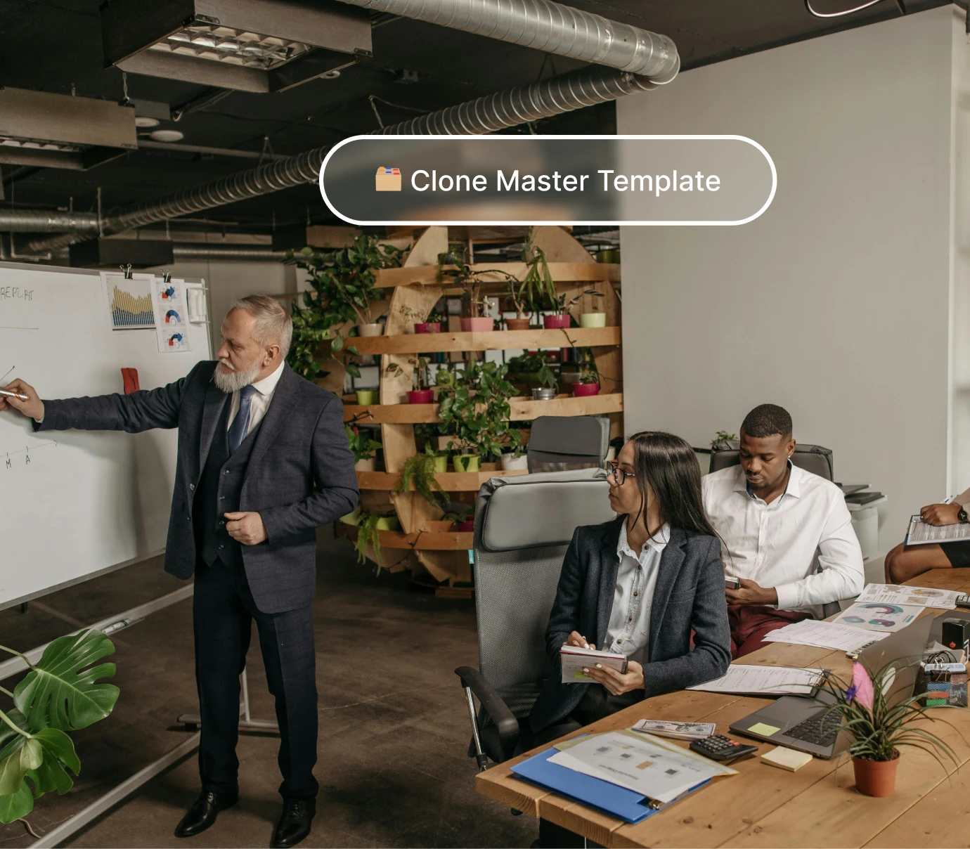 Man in suit presenting data on whiteboard to colleagues in modern office with plants.
