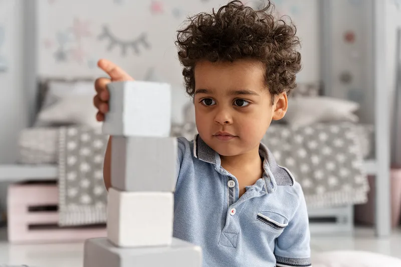 Child playing with blocks
