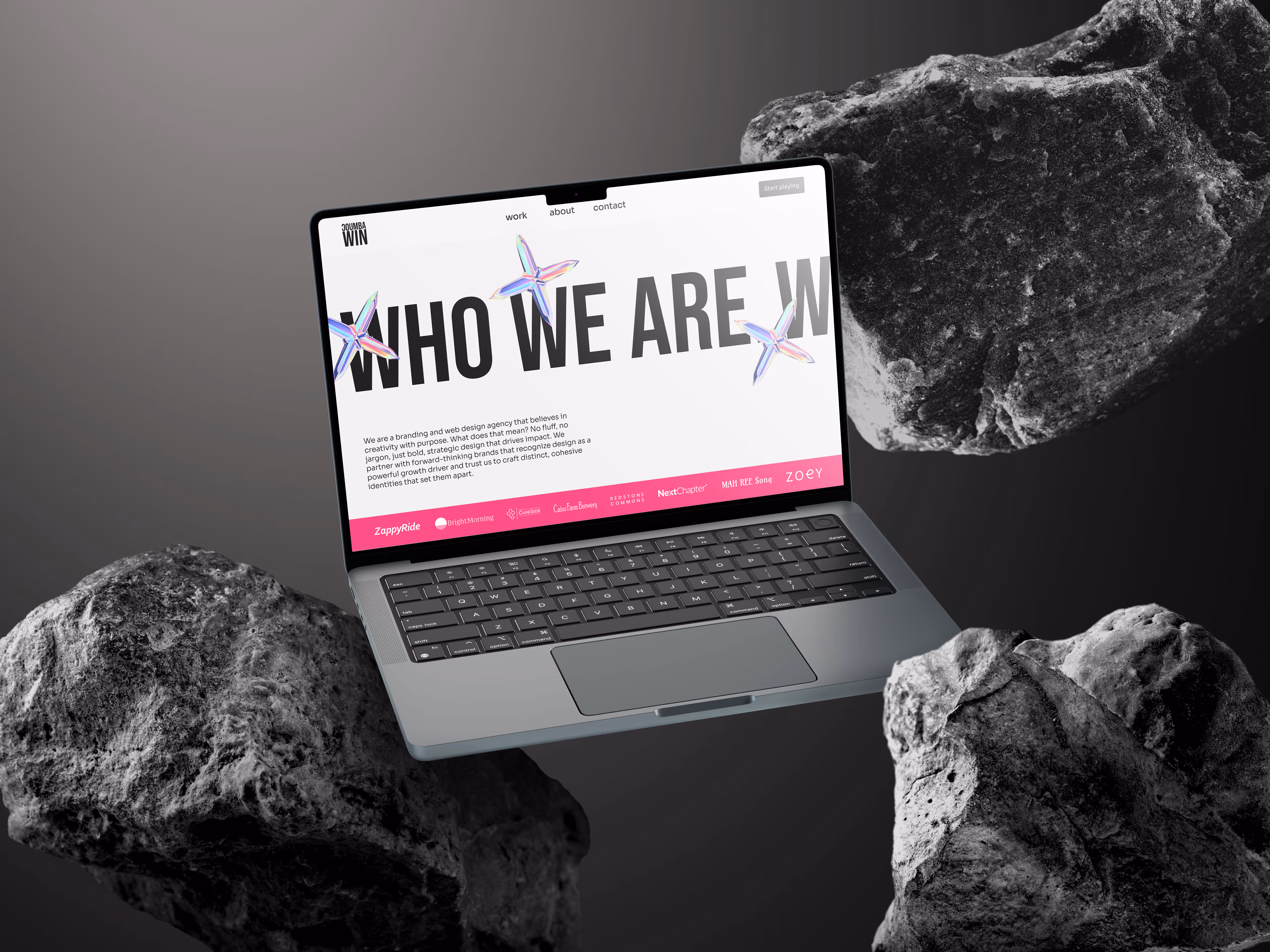 Open laptop mockup displaying the Coumba Win About page with rocks around