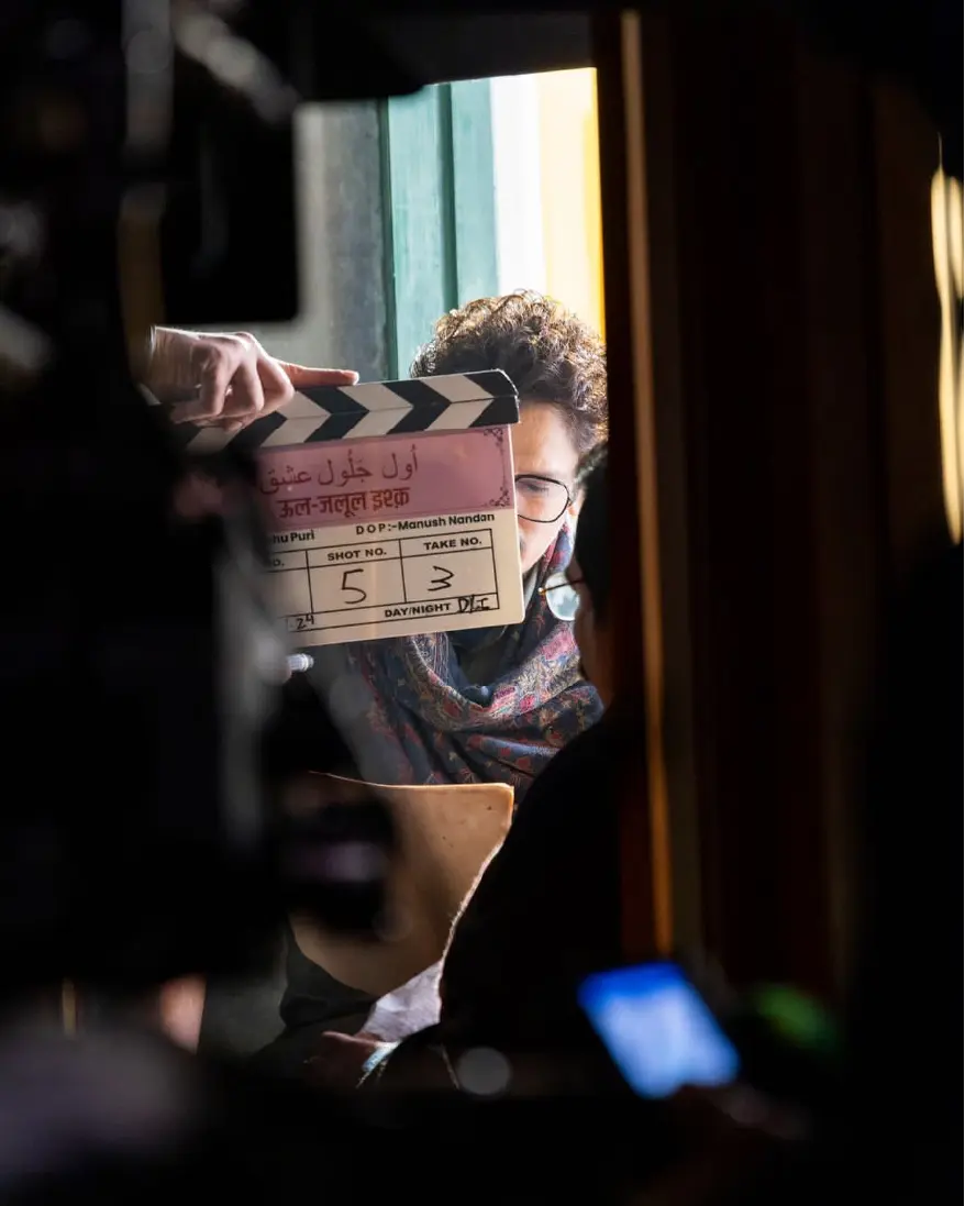 A behind-the-scenes shot from the set of Gustaakh Ishq (Ul Jalool Ishq) featuring a clapperboard.
