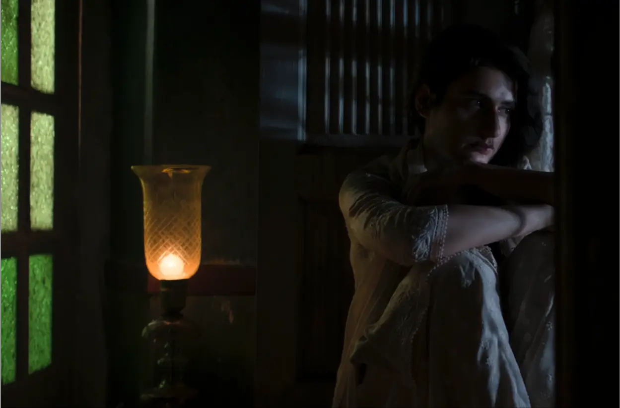 Fatima Sana Shaikh as Minni in an official production still from the film Gustaakh Ishq, featuring an intricate traditional outfit and vintage setting.