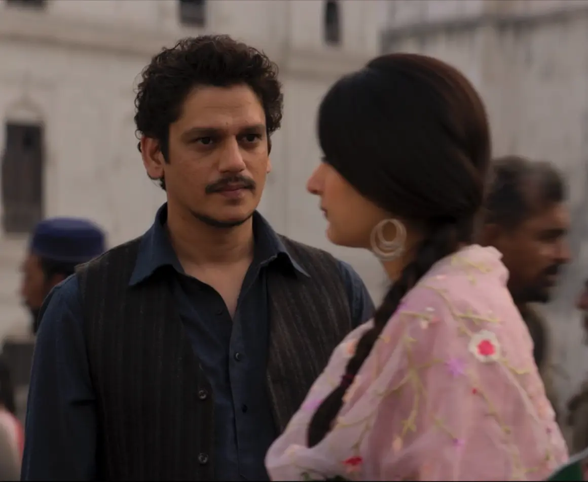 Vijay Varma as Pappan and Fatima Sana Shaikh as Minni share an intense, silent moment in a production still from the film Gustaakh Ishq.