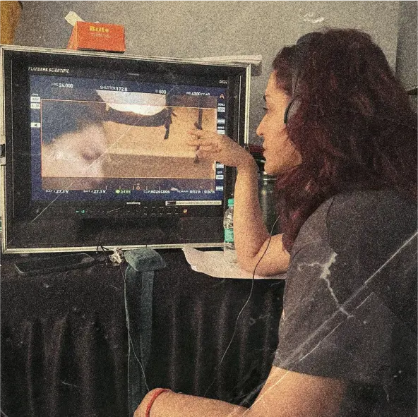 Behind-the-scenes shot of Tisca Chopra at the director's monitor for her film Saali Mohabbat.
