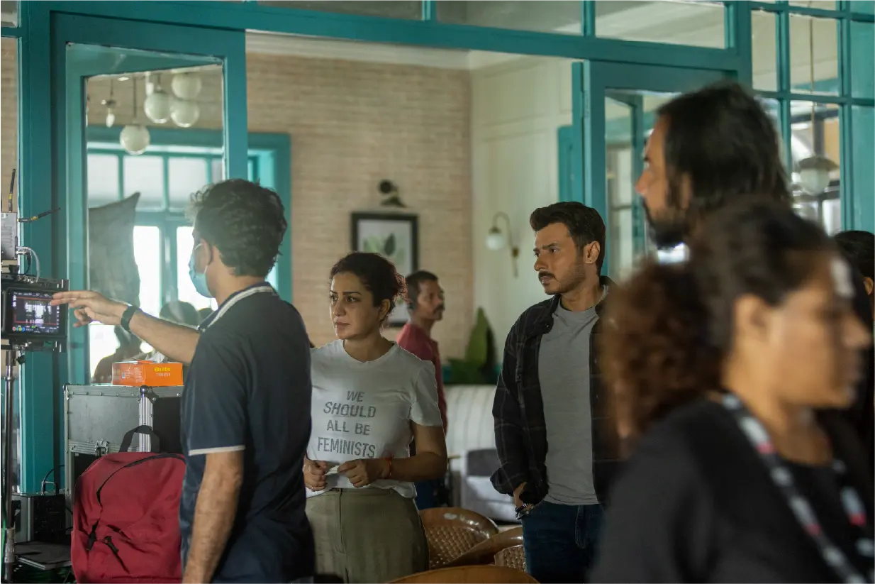 Behind-the-scenes of Saali Mohabbat featuring actor Divyenndu and director Tisca Chopra reviewing a shot on the camera monitor.