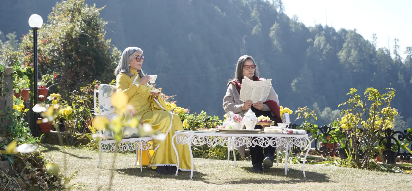 Actresses Zeenat Aman and Shabana Azmi in a production still from Bun Tikki, shot on location in Nainital.