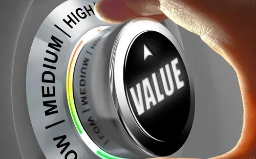 A person pushing a button with the word value.