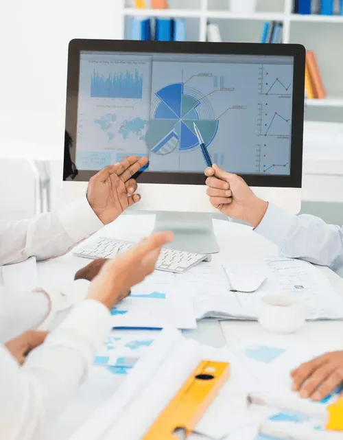 A business owner looking at a chart of their business's financial performance.