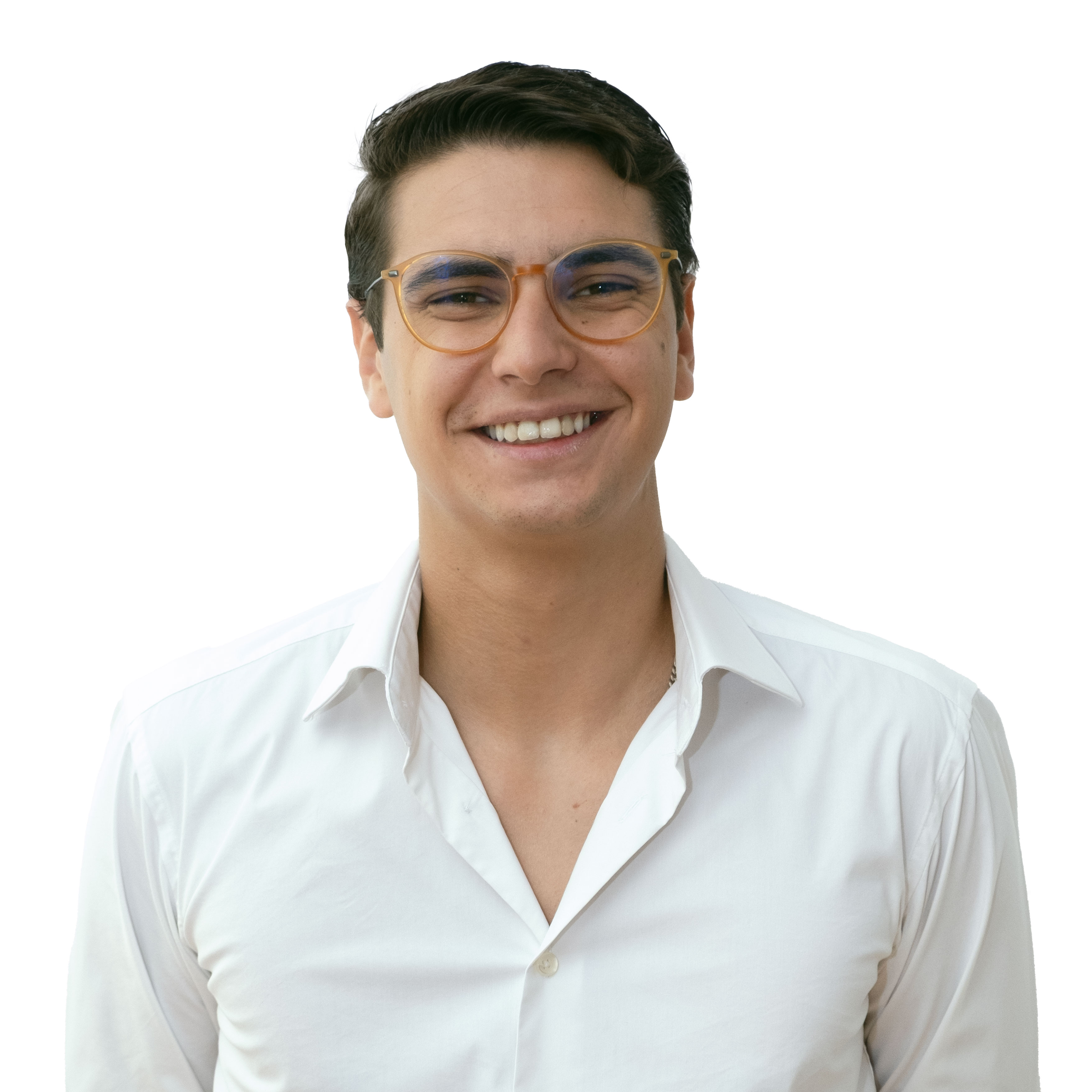 Smiling young man wearing a white shirt and transparent brown glasses against a white background.