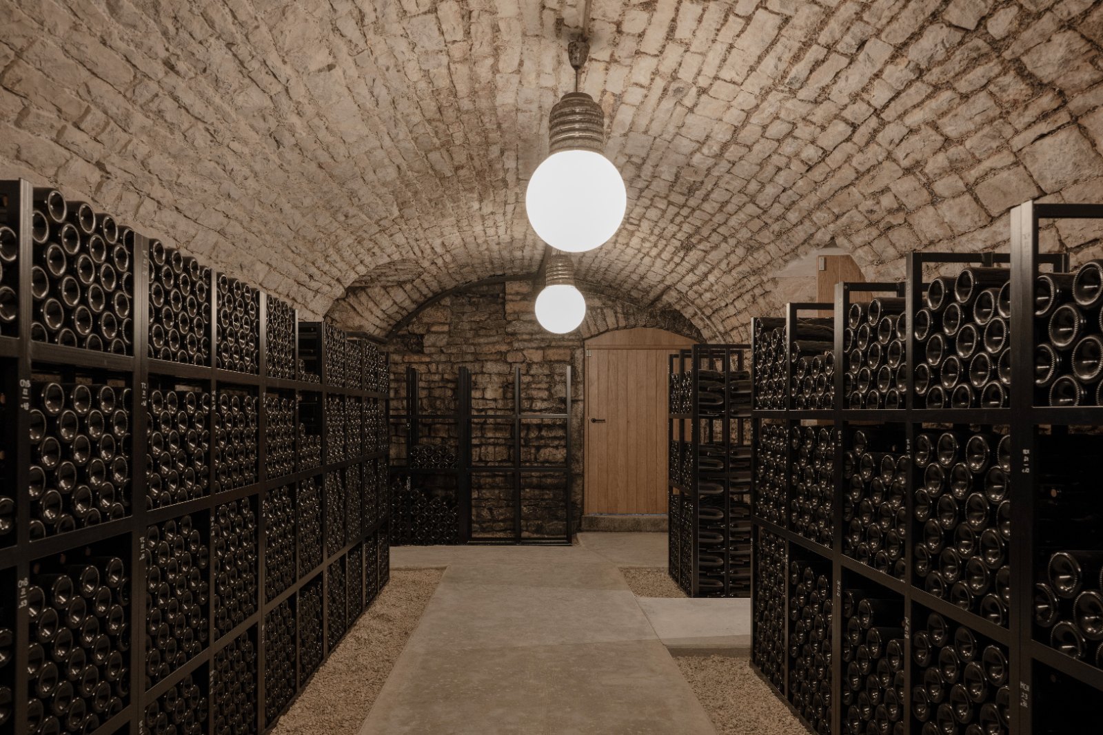 Bottles in the vaulted stone cellar