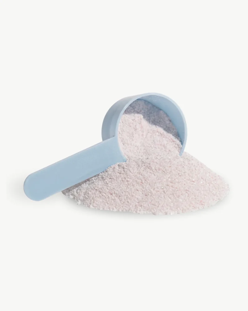 kēpos powder spilling from its blue scoop