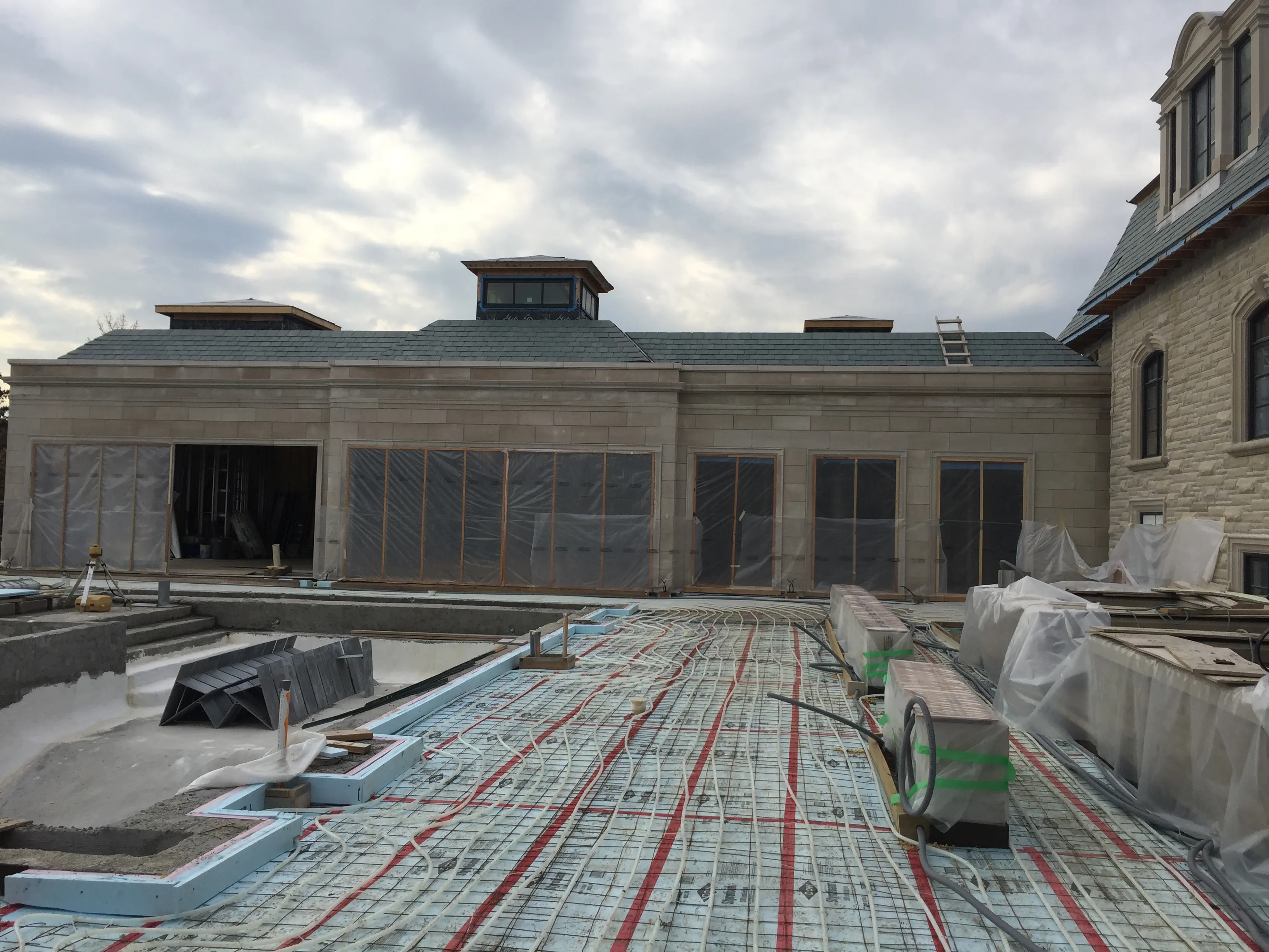 Radiant heat tubing and rebar laid out for a large concrete slab pour