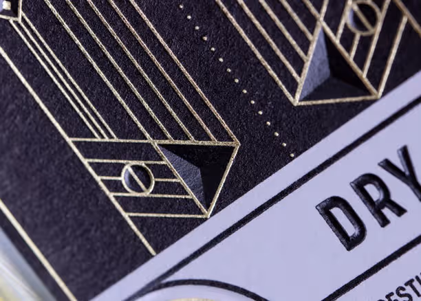 Foil embossing detail on a gin label