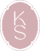 Logo with intertwined letters K and S inside an oval border with decorative edges on a pink background.