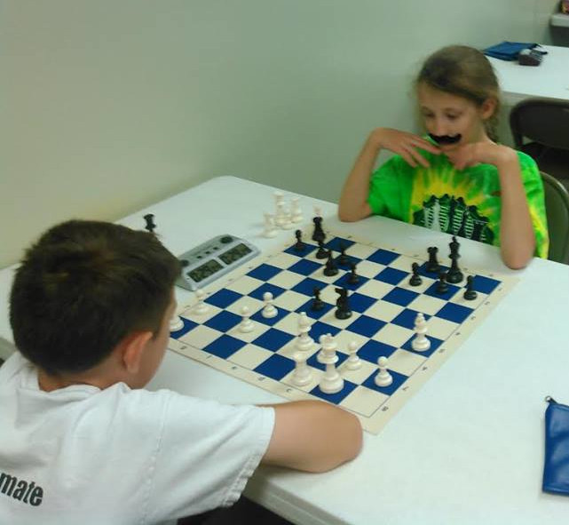 A photo of Sensei Johnson and his chess camp students!