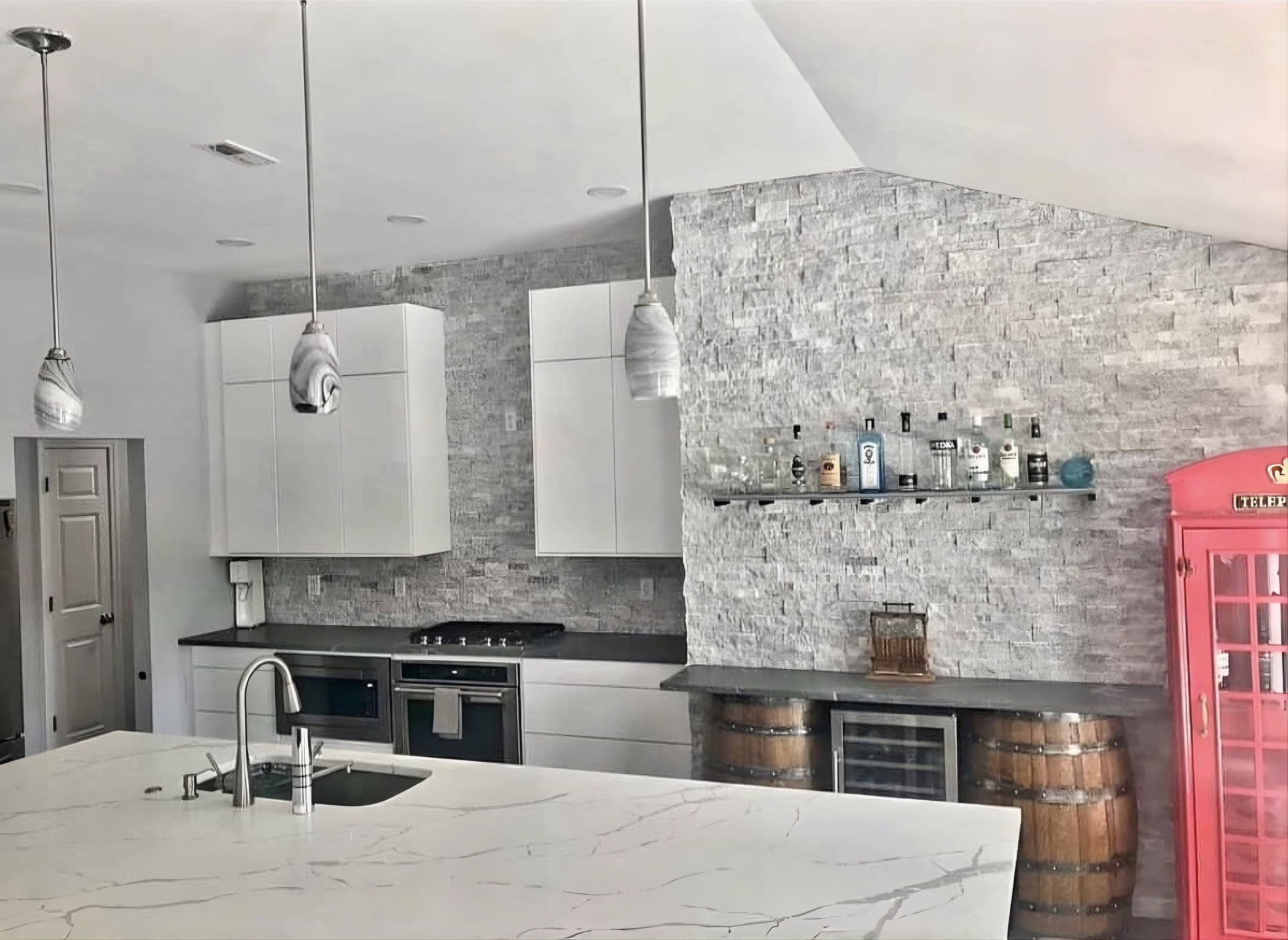 Refined kitchen backsplash with warm cabinetry, clean tile lines, and polished finish details