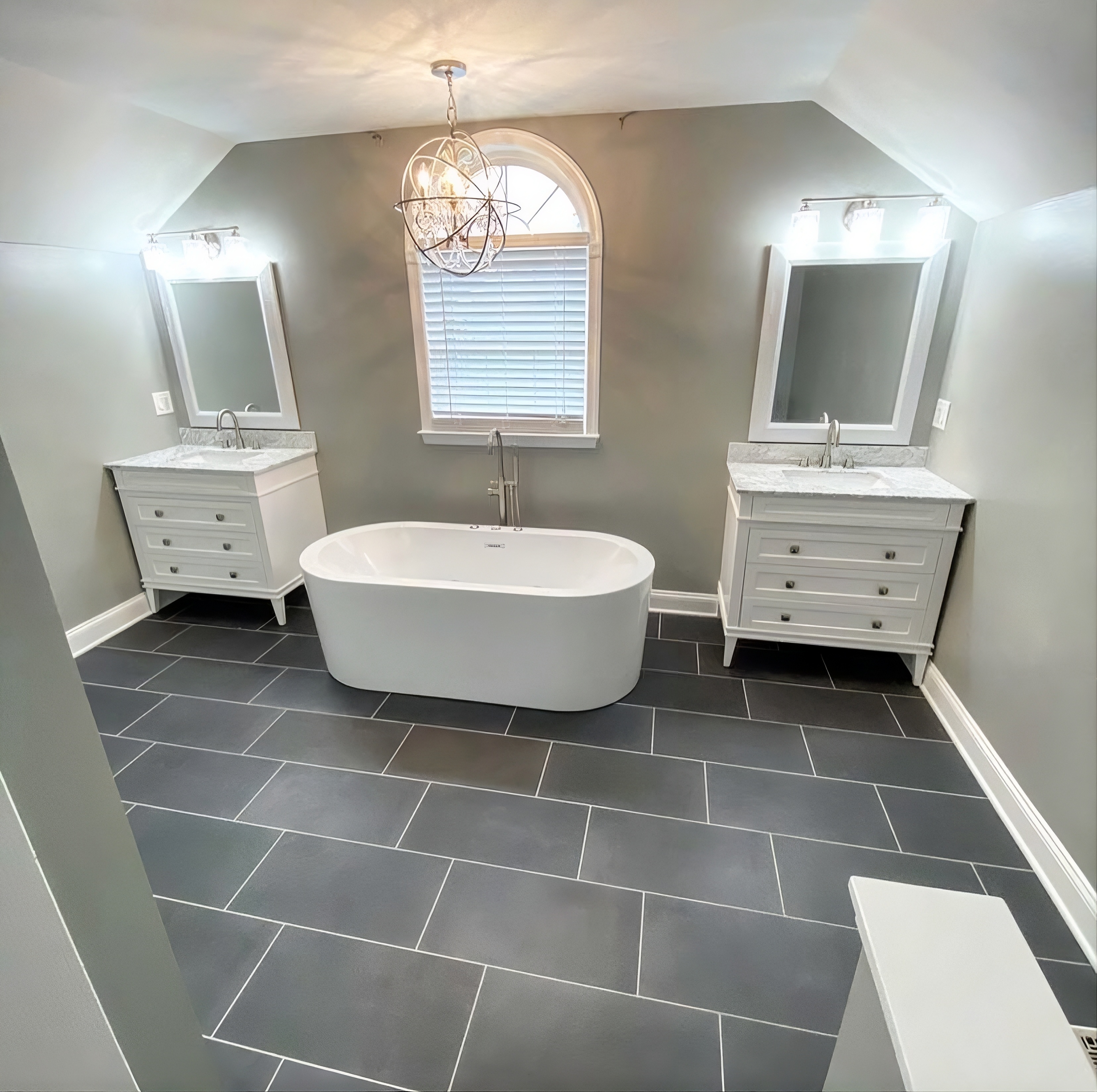 Selected bathroom upgrade with tile detail, clean transitions, and warm finish selections