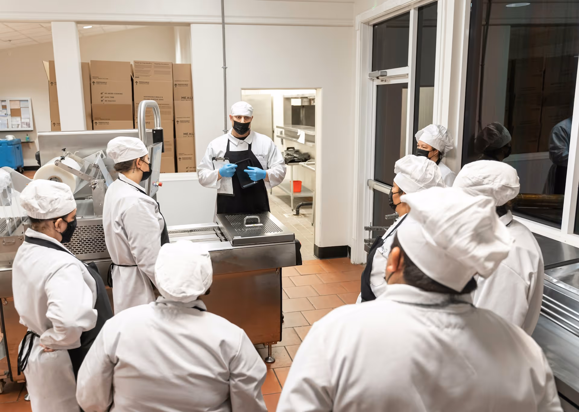  Foodservice team preparing orders in a commercial kitchen