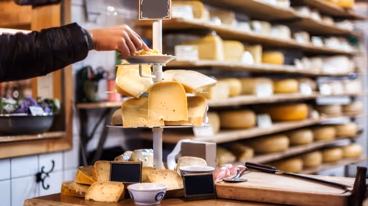Pre-cut cheese portions in retail-ready packaging