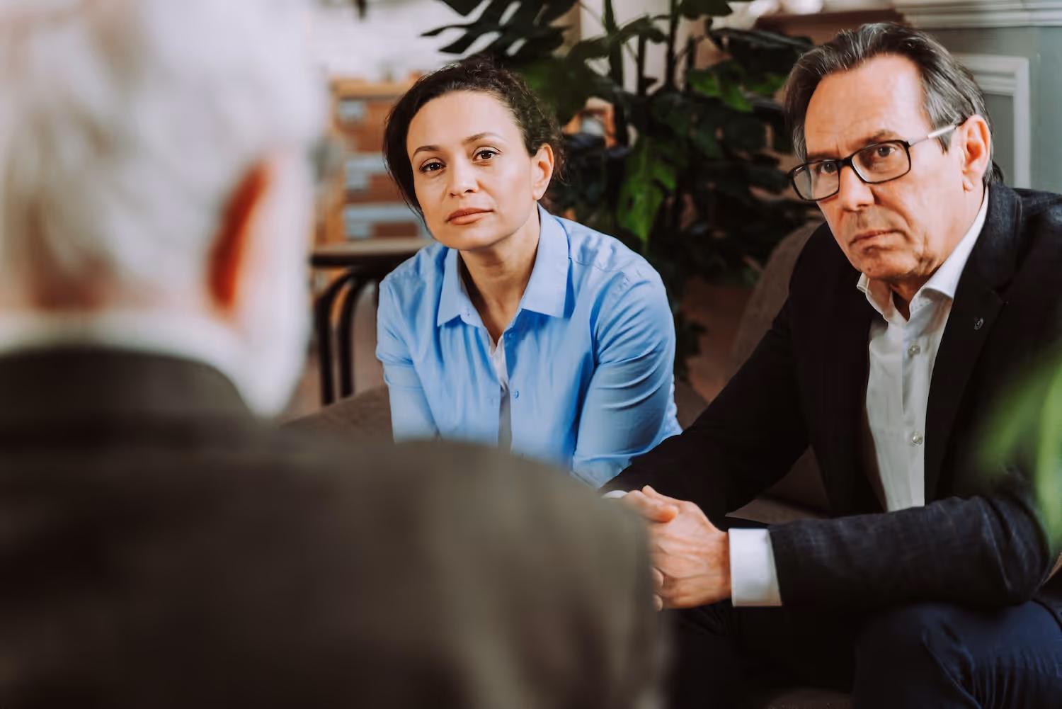 Couple talking to attorney