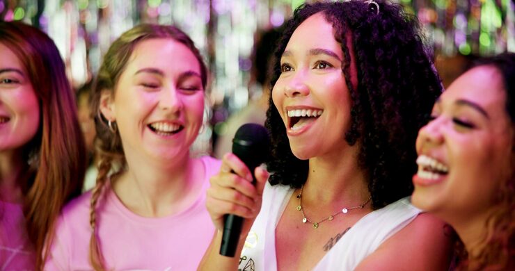 People practicing singing together 