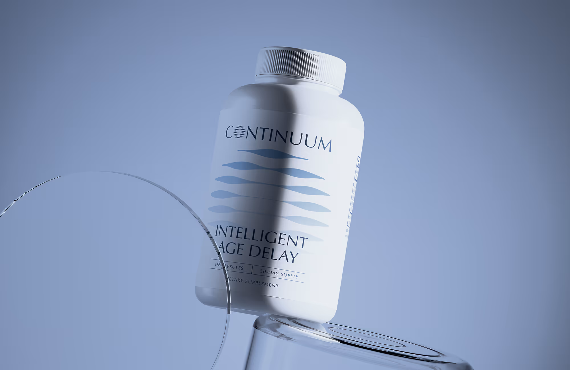 White supplement bottle labeled Continuum Intelligent Age Delay on a tilted clear glass surface.