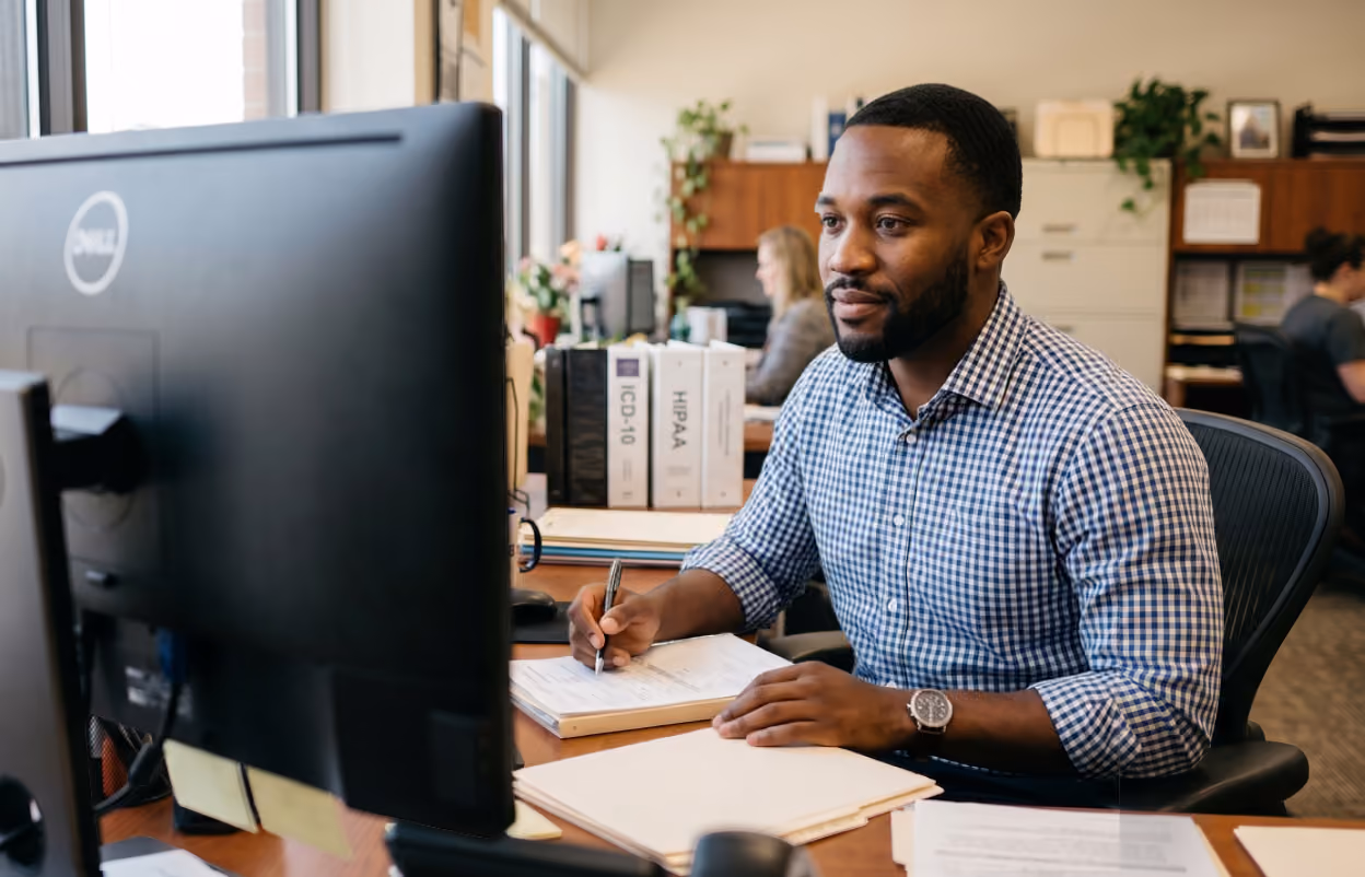 Clinician reviewing coding suggestions about dyslipidemia type to get accurate ICD-10 and CPT codes based on the patient visit.