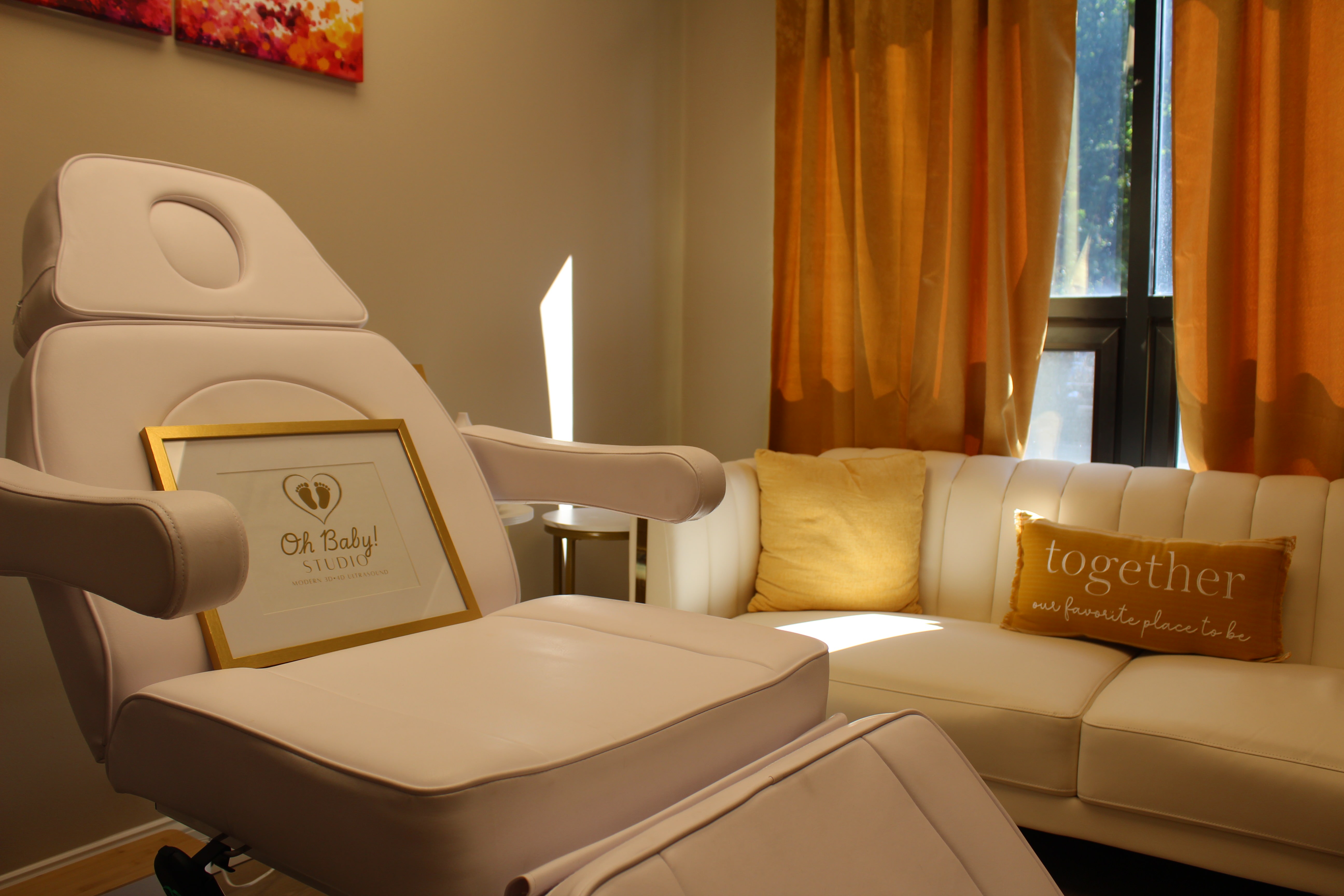 image of an ultrasound machine in a consulting room of a medical clinic