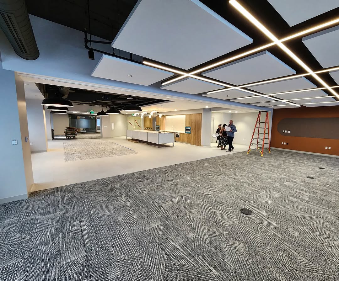 CHC active construction site with workers and equipment.