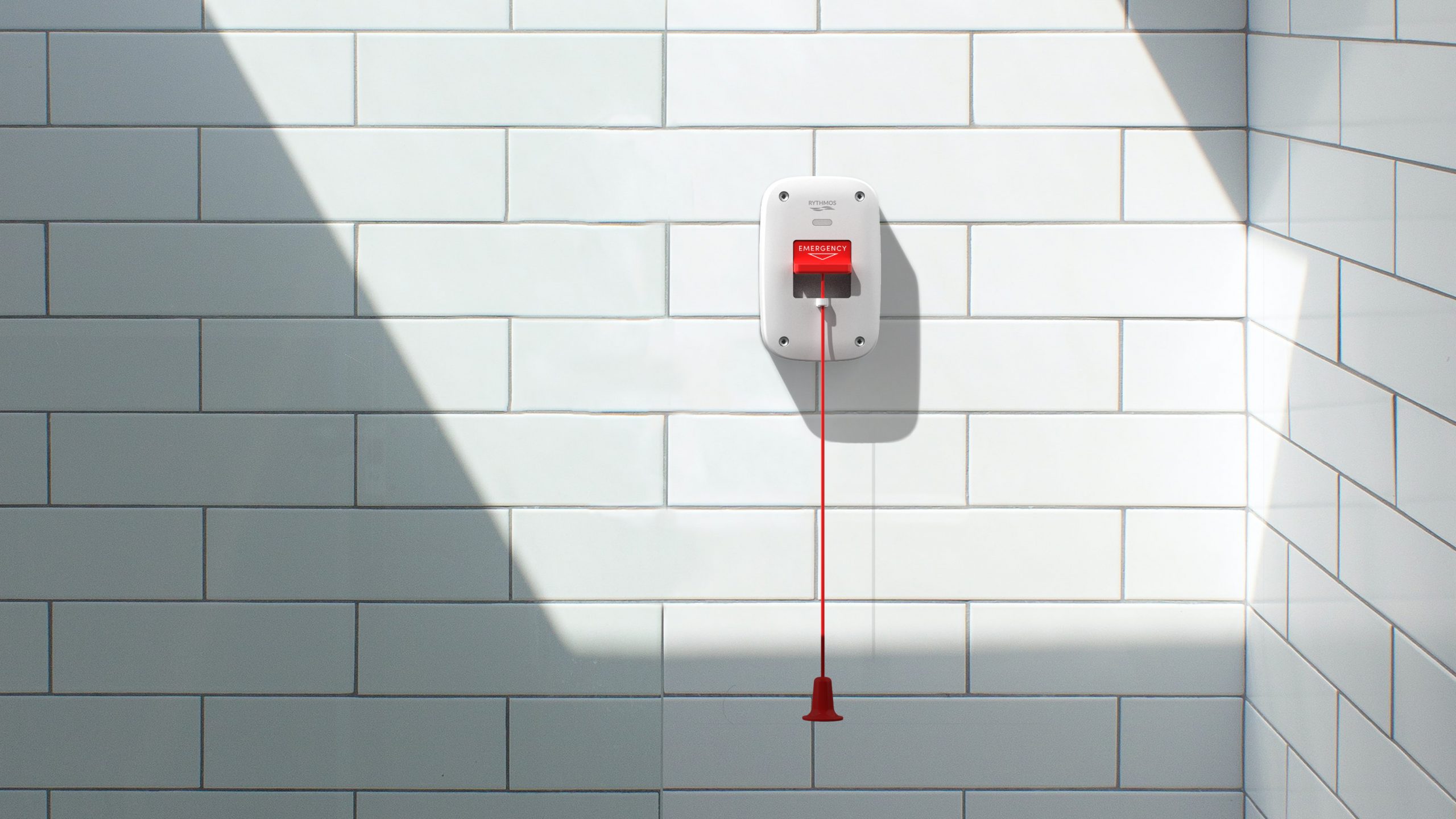 Rythmos Pull Cord emergency alert device mounted in bathroom