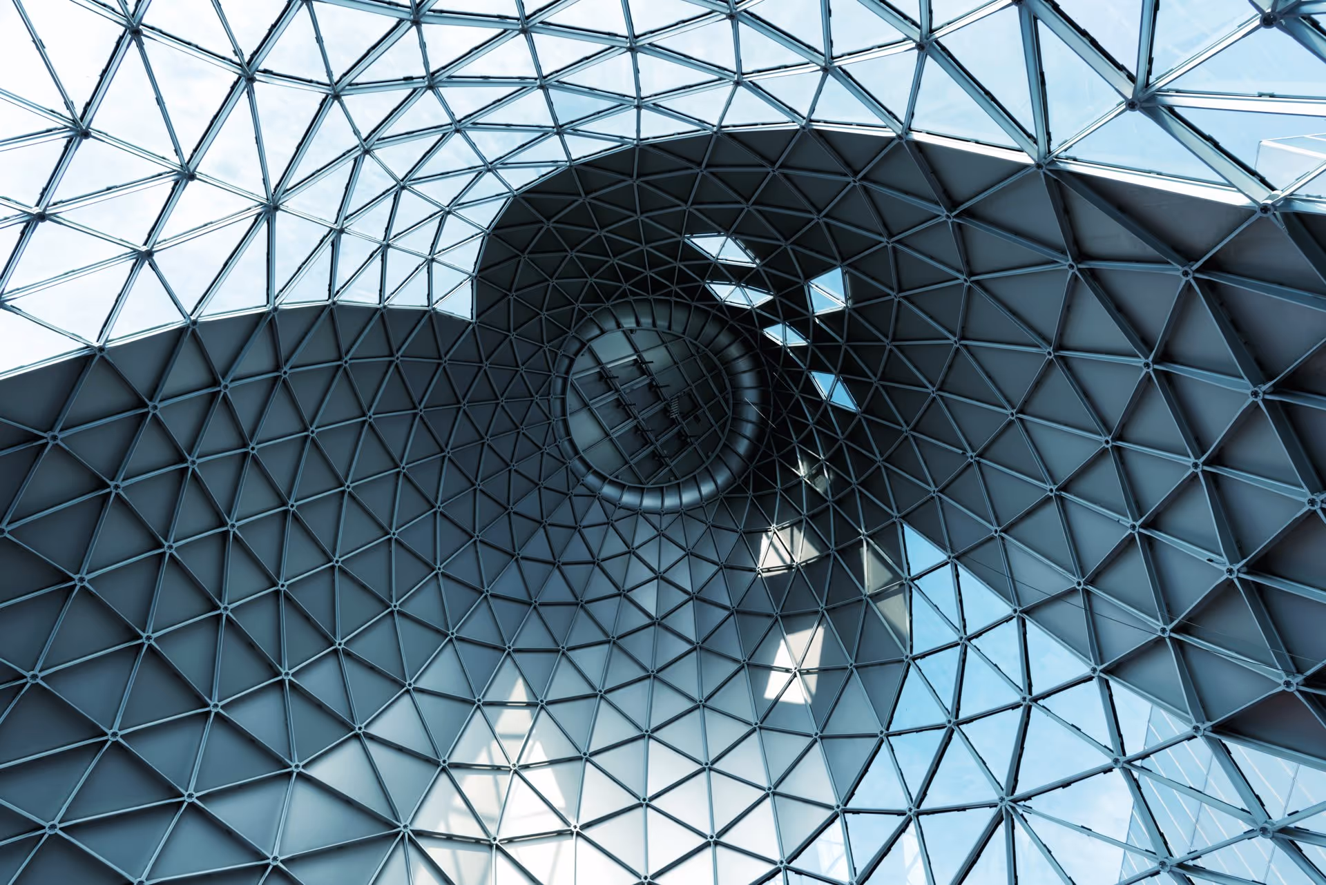 Modern architectural glass dome interior with geometric pattern and skylight, contemporary architecture photography