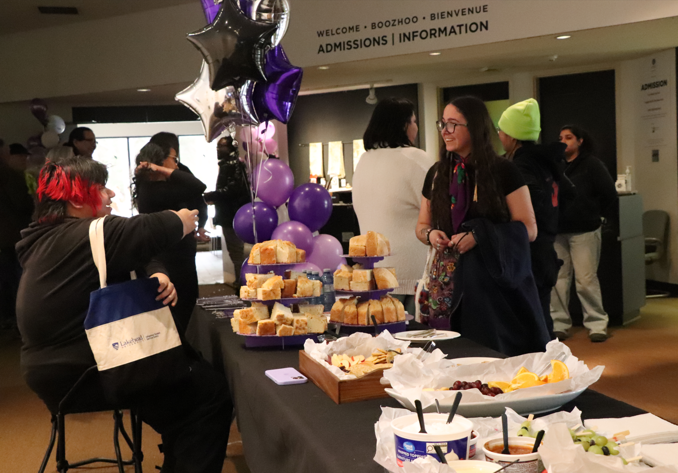 People mingling and talking at the event