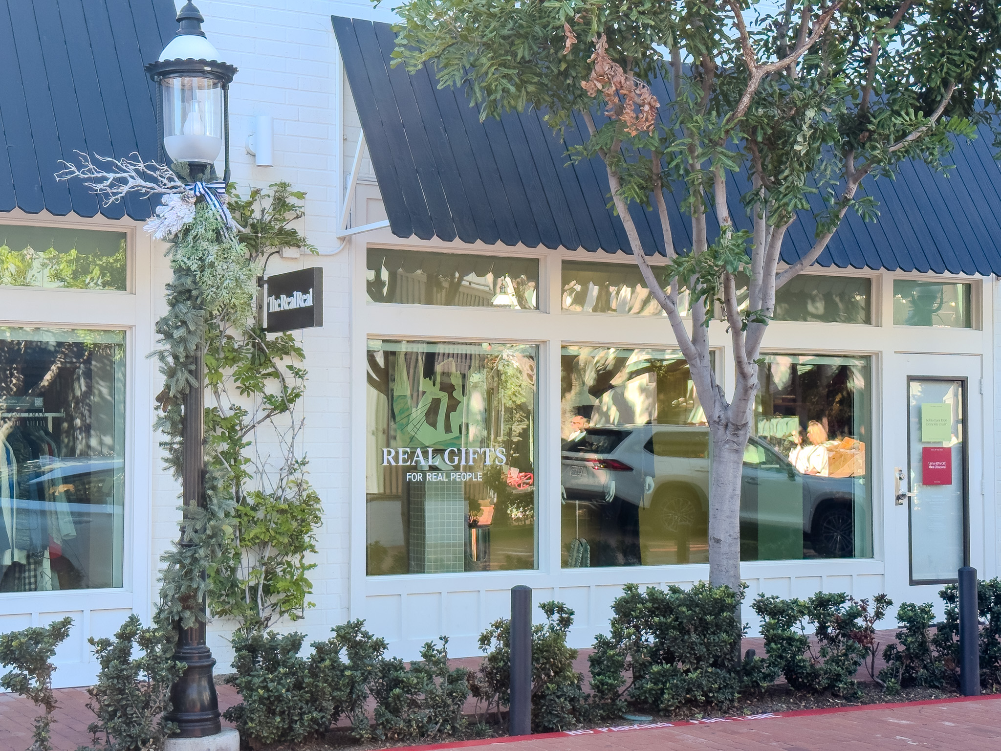 designer handbags and fine jewelry on display at the realreal in newport's lido marina village