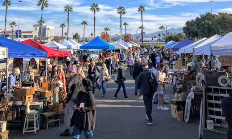 outdoor vendor booths and vintage finds at the coast vintage market in laguna hills