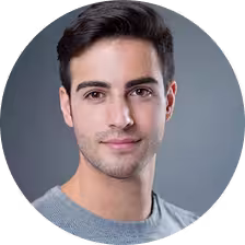 Studio portrait with neutral background and even lighting.