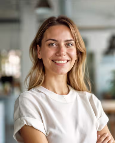 Soft, natural portrait with a neutral background.