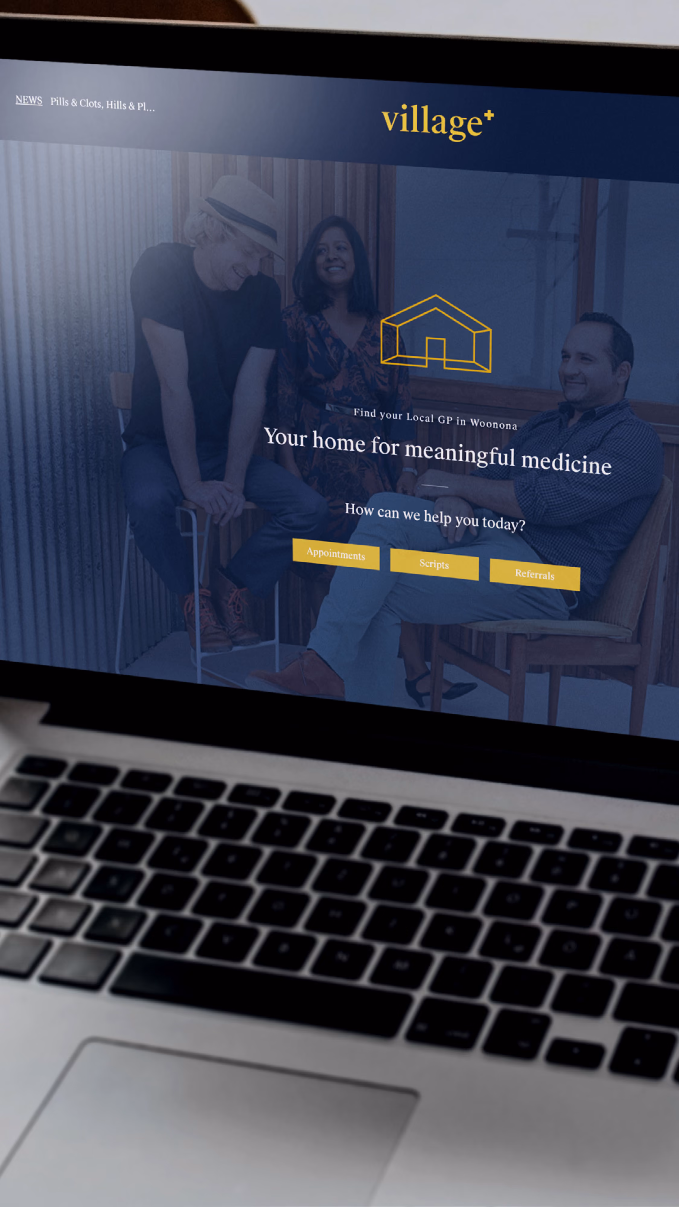 Laptop screen showing a medical website with three people sitting and smiling, featuring the text 'Your home for meaningful medicine' and buttons for appointments, scripts, and referrals.