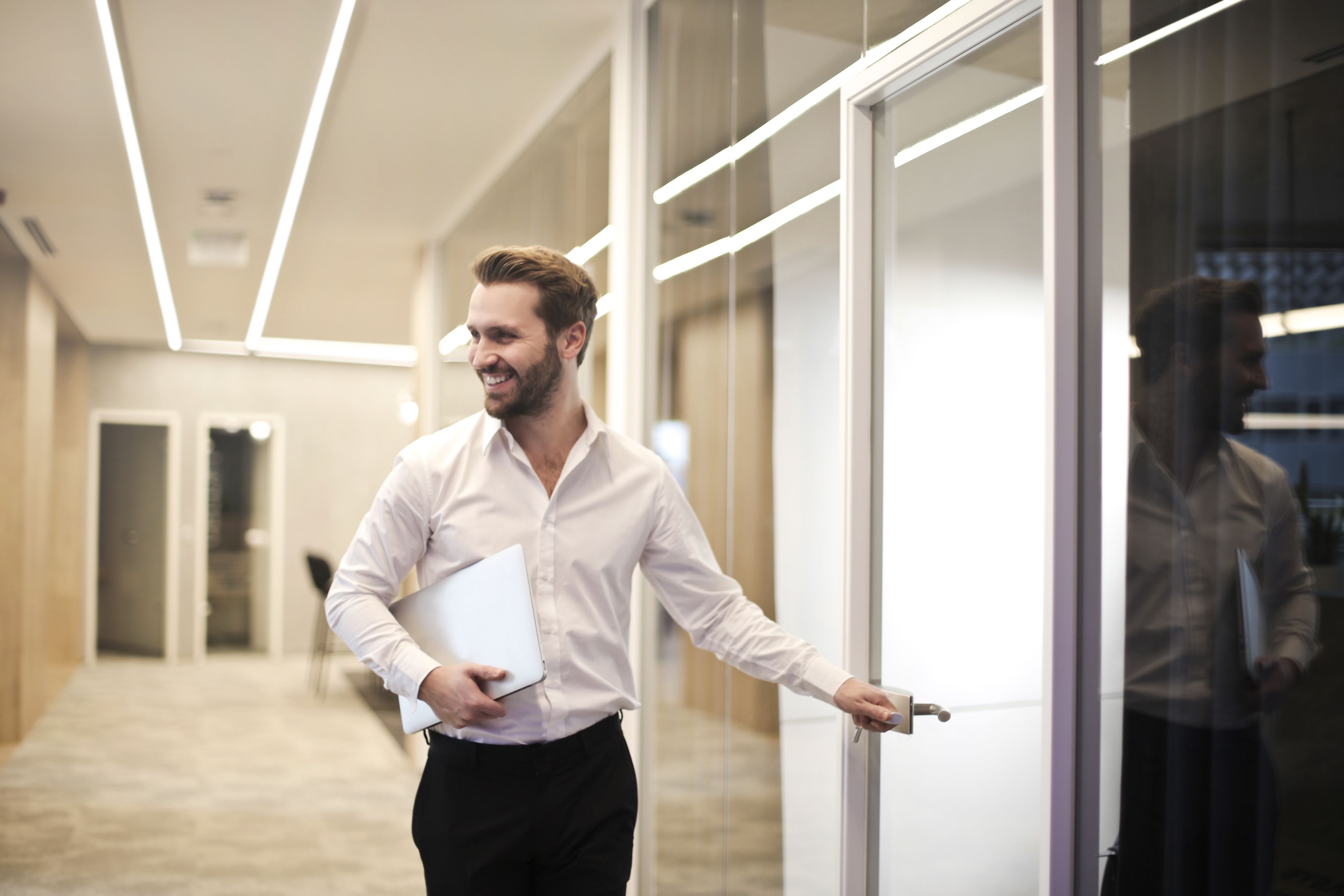 Older gentleman quietly leaving a family boardroom