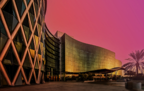 New Company Formation in Dubai with modern architectural building at sunset