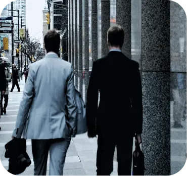 Best Business To Start In Dubai: Professionals walking urban street confidently