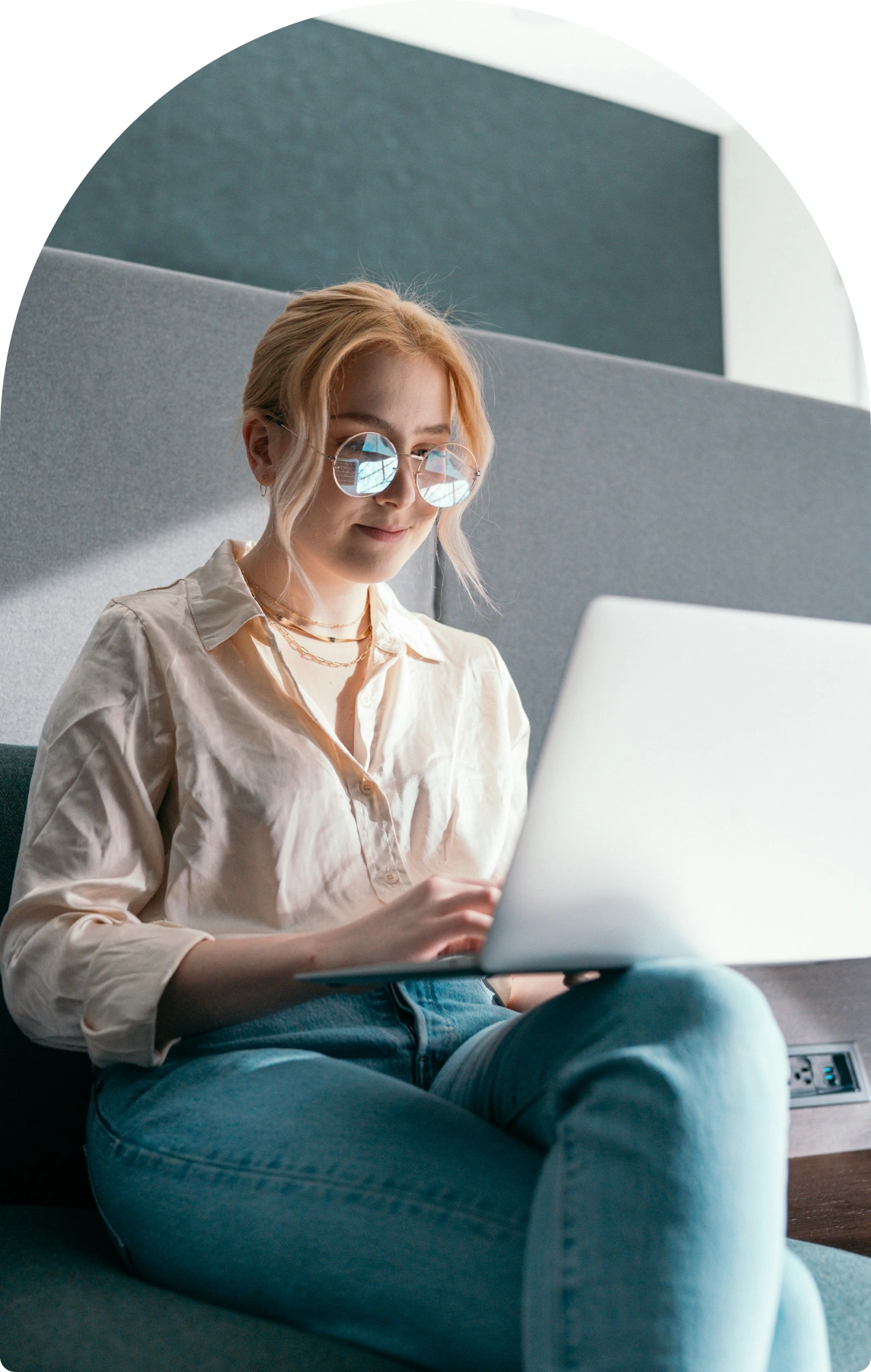 Meydan FZ workspace with professional working on laptop, minimalist decoration