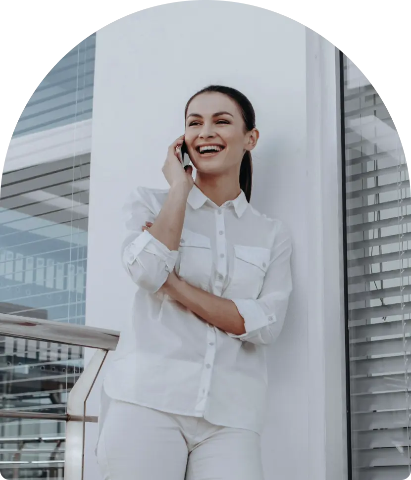 Establish Company In Dubai: Smiling professional woman in white outfit