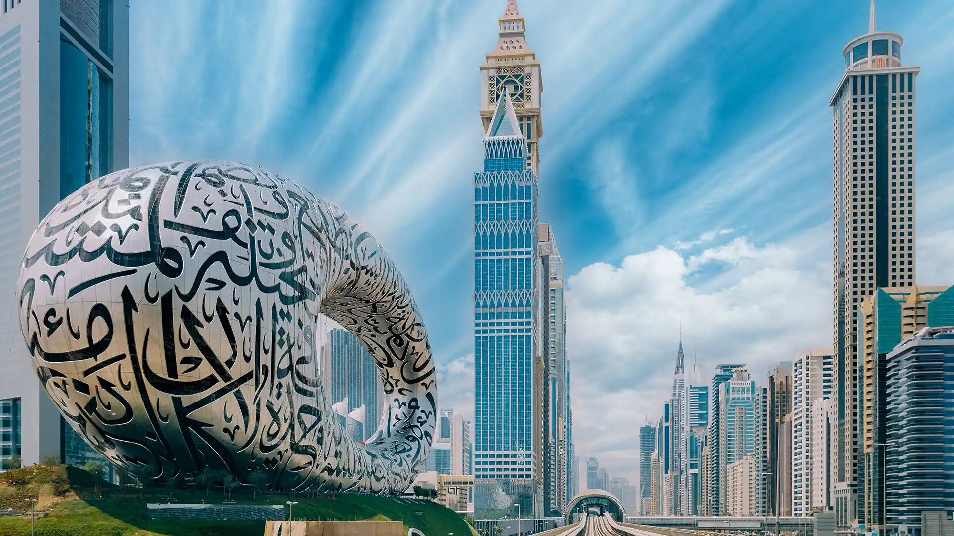 Dubai's Museum of the Future, a torus-shaped building with calligraphy, stands by a clock-tower skyscraper.